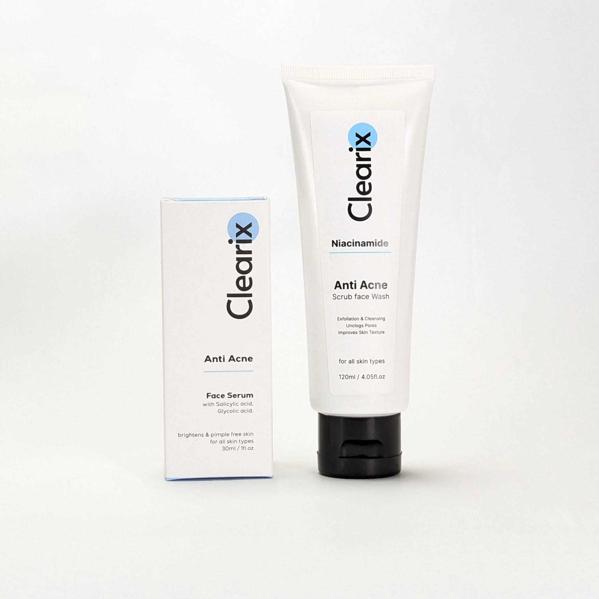 Clearix skincare products displayed against a white background. The image features two items: a Clearix Anti-Acne Face Serum in a white box with blue accents, formulated with salicylic acid and glycolic acid for brightening and acne treatment, and a Clearix Niacinamide Anti-Acne Scrub Face Wash in a white tube designed for exfoliation, unclogging pores, and improving skin texture.