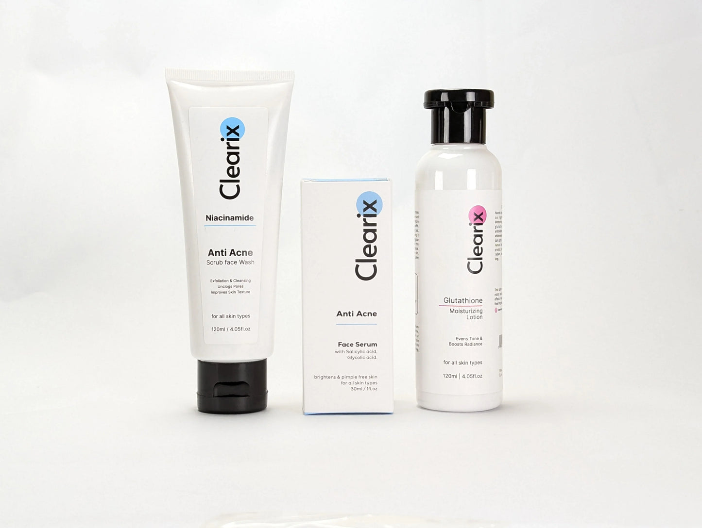 Clearix skincare products displayed on a white background. The lineup includes a Clearix Niacinamide Anti-Acne Scrub Face Wash in a white tube, a Clearix Anti-Acne Face Serum in its original white and blue packaging, and a Clearix Glutathione Moisturizing Lotion in a white bottle with a flip-top cap. These products are formulated to target acne, brighten skin, and provide hydration.