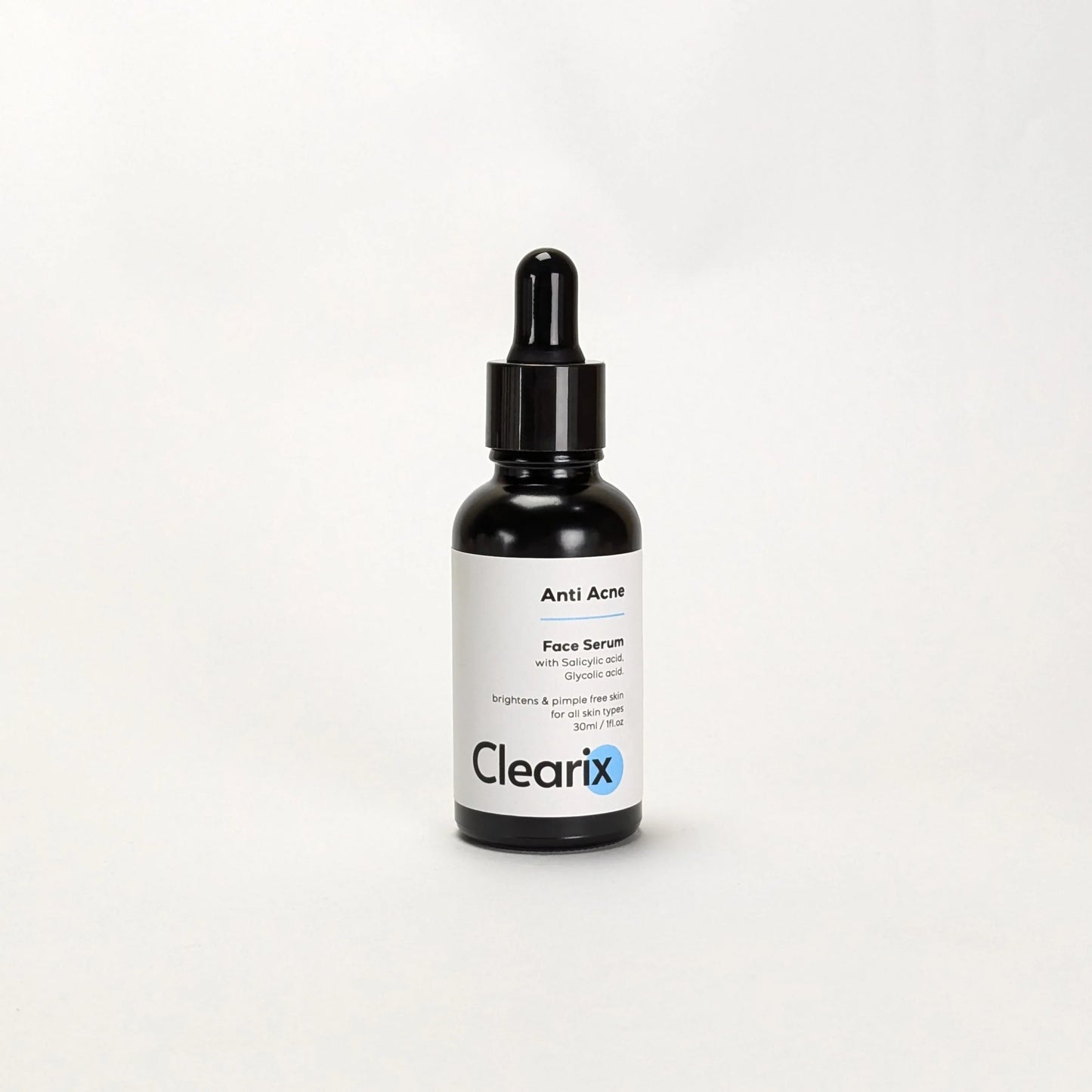 Clearix Anti Acne Face Serum in a black dropper bottle displayed against a white background. The label highlights key ingredients such as salicylic acid and glycolic acid, promoting brightening and pimple-free skin. Designed for all skin types.