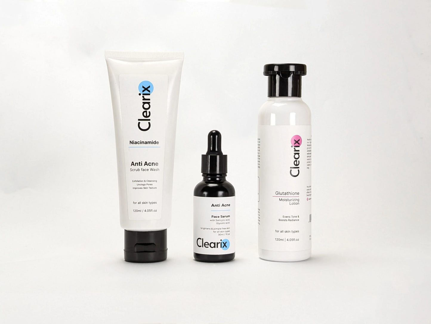 Clearix skincare products displayed against a white background. The image features three items: a Clearix Niacinamide Anti-Acne Scrub Face Wash in a white tube, a Clearix Anti-Acne Face Serum in a black dropper bottle, and a Clearix Glutathione Moisturizing Lotion in a white bottle with a flip-top cap. Each product is designed for skincare benefits like exfoliation, acne treatment, and hydration.