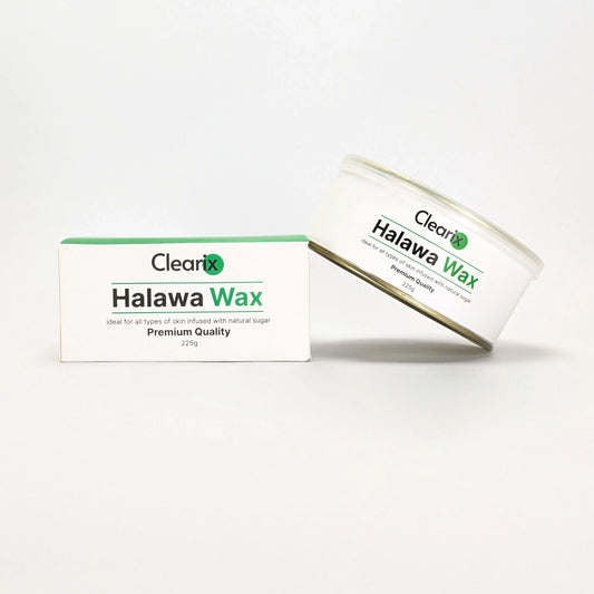 Clearix Halawa Wax hair removal product displayed against a white background. The image features two items: a Clearix Halawa Wax tin and its matching packaging box. The product is infused with natural sugar and designed for all skin types, offering premium-quality hair removal.